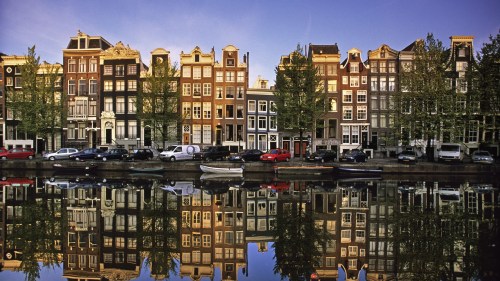 reflections-in-a-canal-in-amsterdam-252862